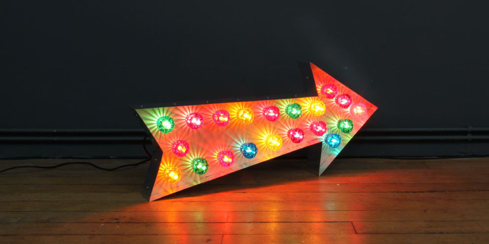 large fairground arrow bulb sign