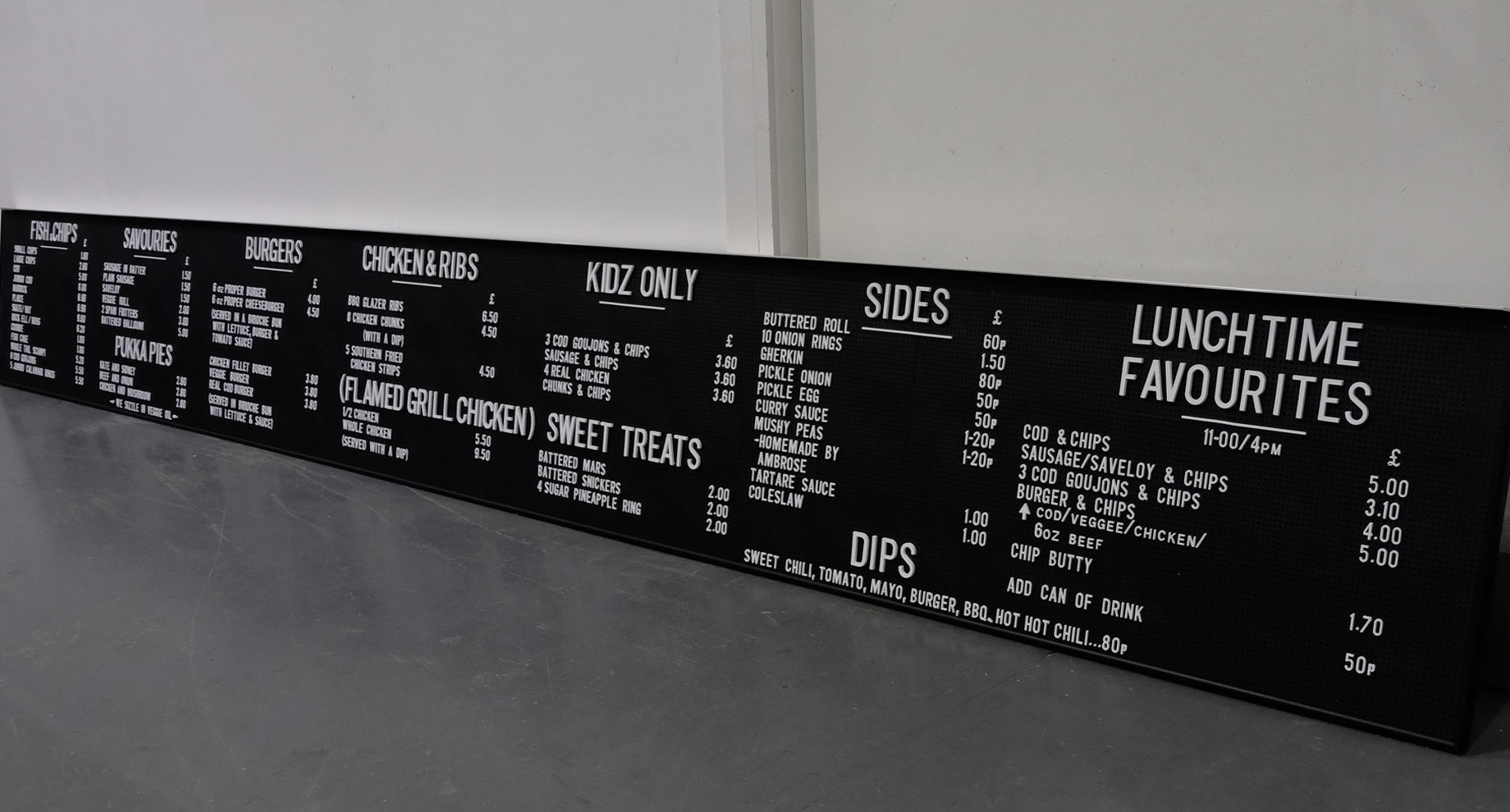 Long peg board menu sign