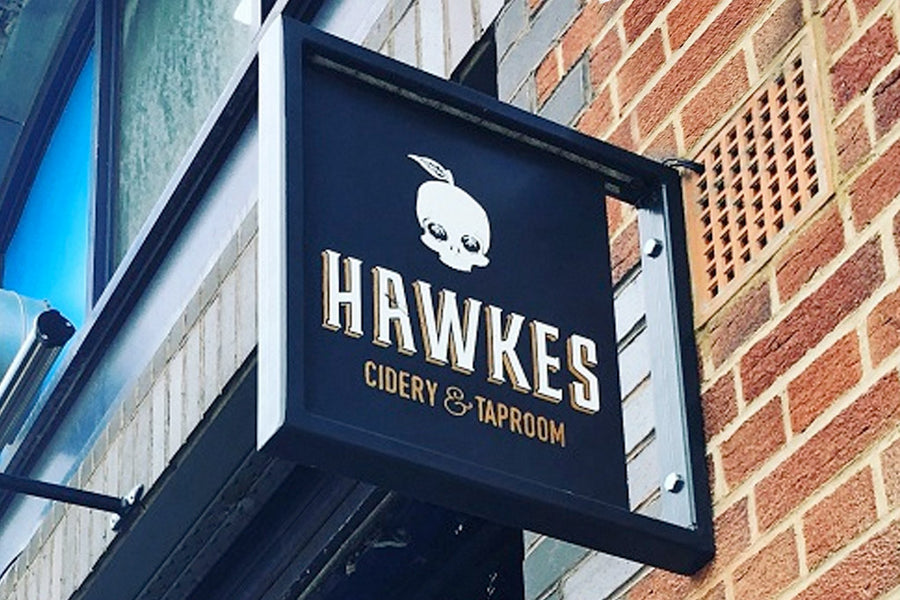 Metal box section shop sign