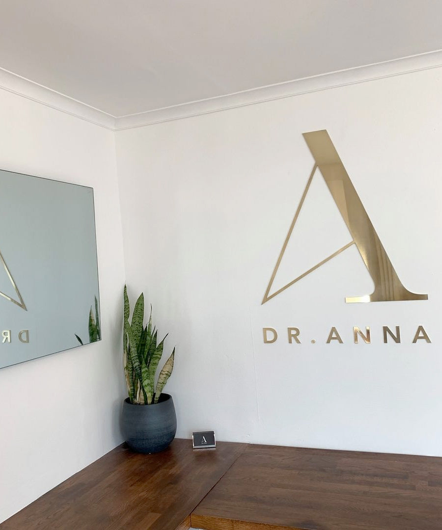 brass logo sign