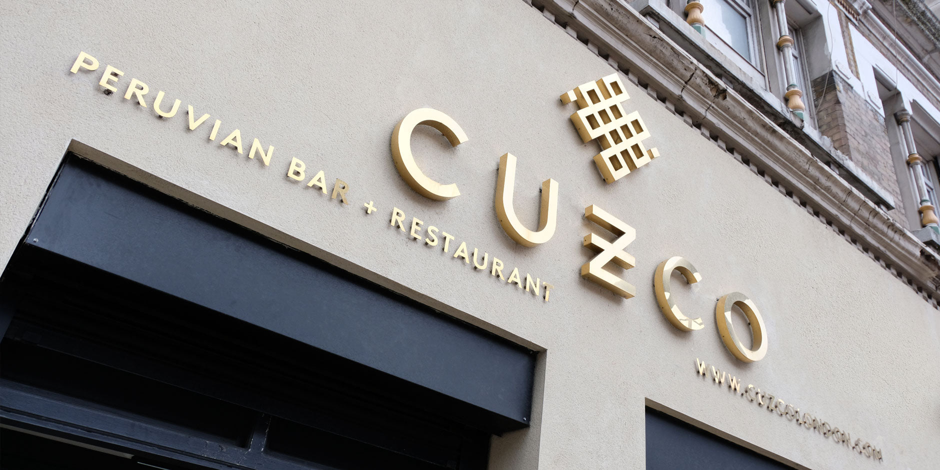 gold restaurant sign