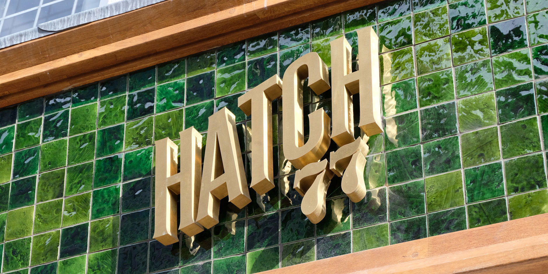 brass restaurant sign