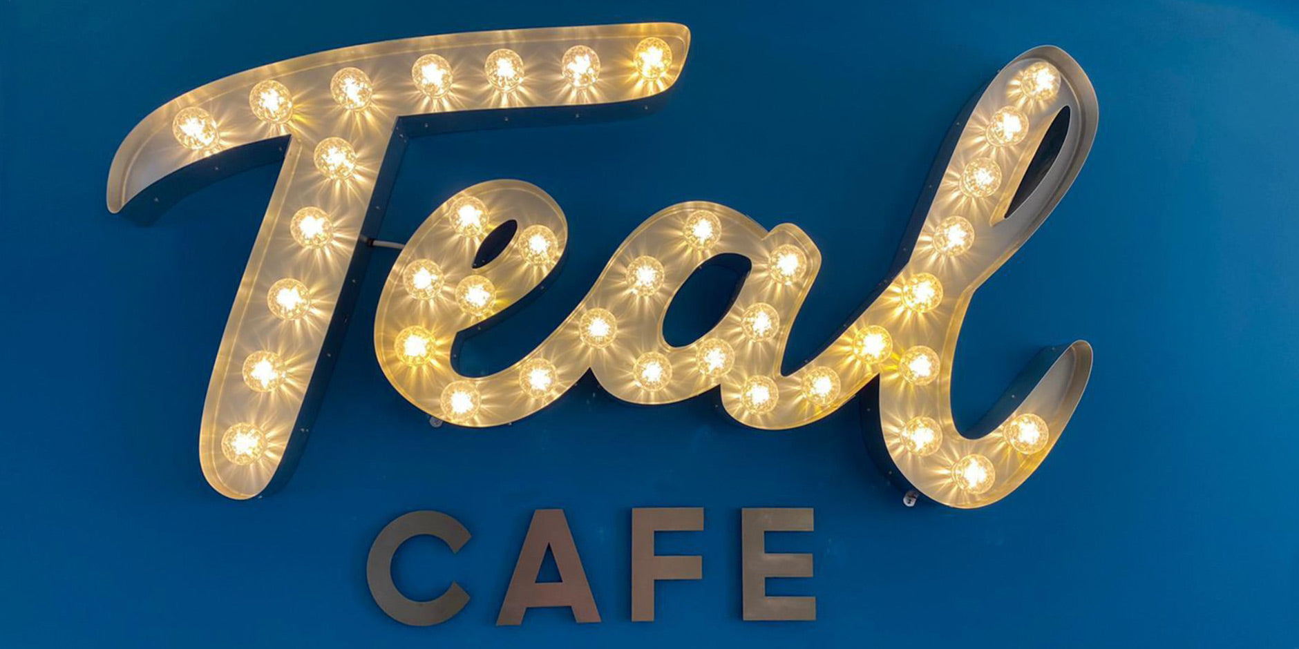 Teal light up letters