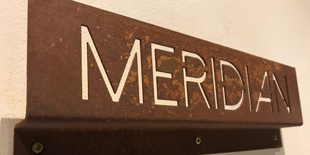 Rusted wayfinding sign